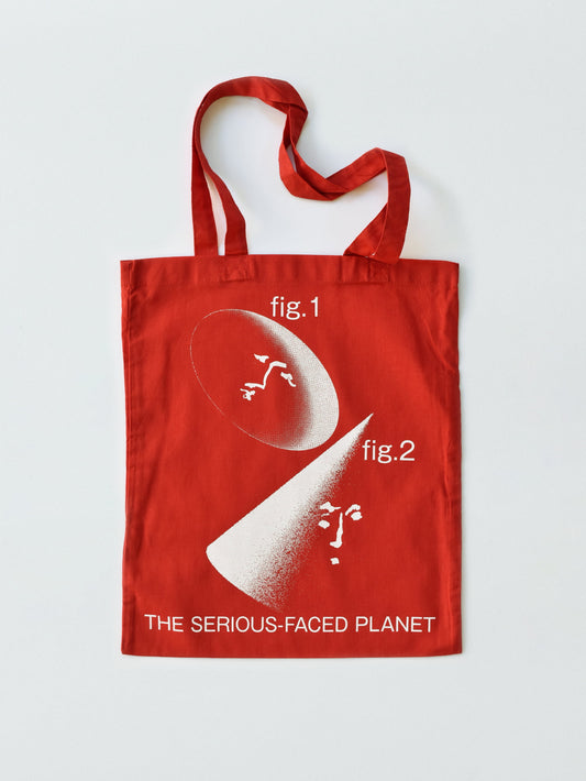 THE SERIOUS-FACED PLANET TOTE BAG